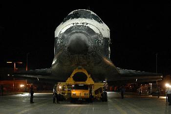 STS-116 - Discovery rolls out of its processing facility at NASA's Kennedy Space Center for the short trip to the Vehicle Assembly Building